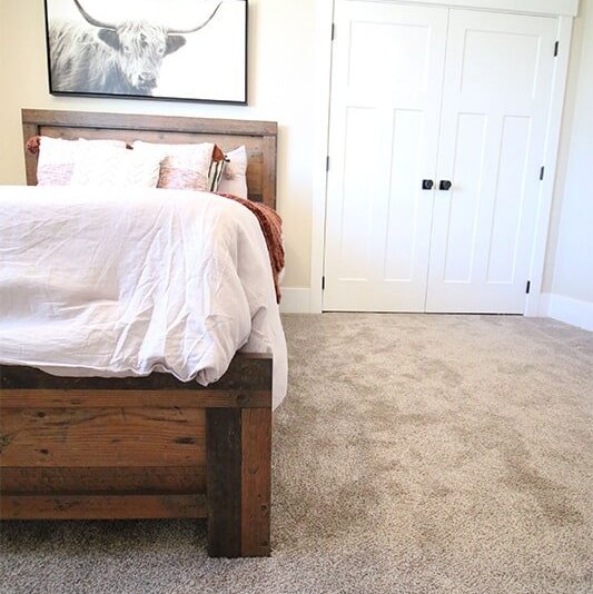 Rustic bedroom at 'The James' from Pioneer Floor Coverings & Design